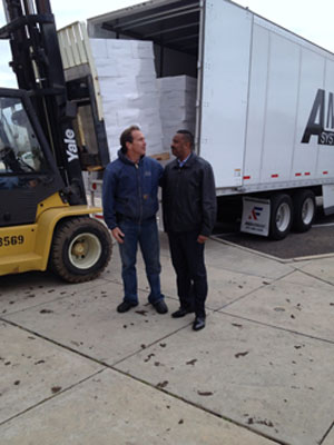 RainSoft dealer Curt Wunder (left) and Atlantic City Mayor Lorenzo Langford passed out bottled water to residents of the New Jersey seaside community who were affected by Hurricane Sandy.